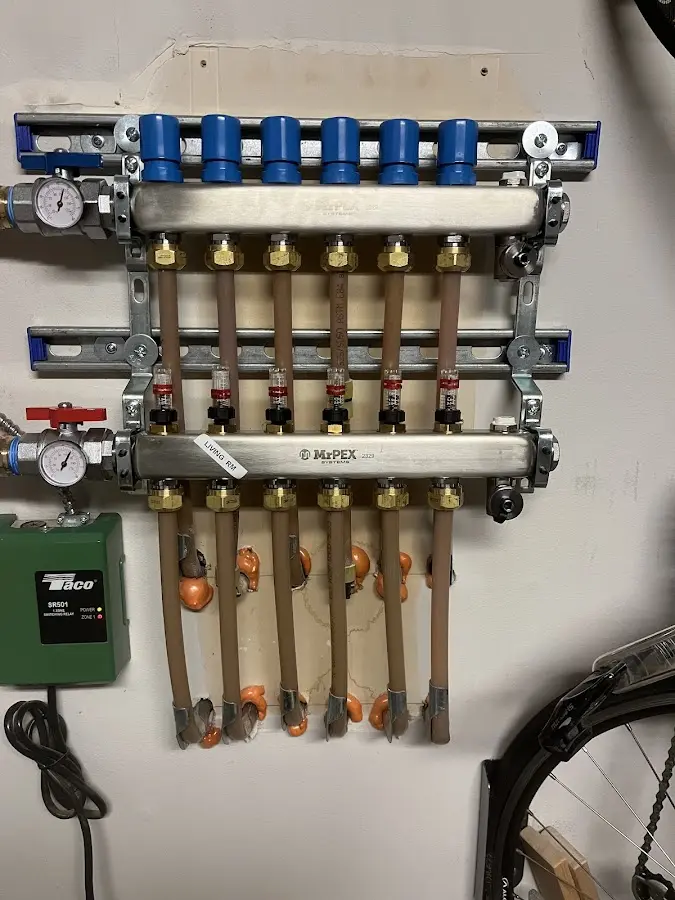 Plumber performing Water Heater Repair at a residential property in Prairie du Chien